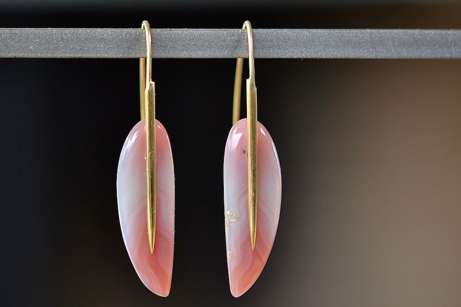 Feather earrings in red agate by Rachel Atherley.