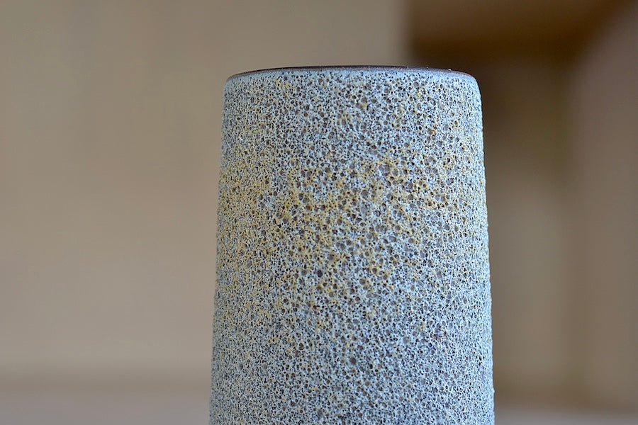 Close up of Blue and Yellow Volcanic Glaze vase by Heather Rosenman. Hand Thrown in Los Angeles.
