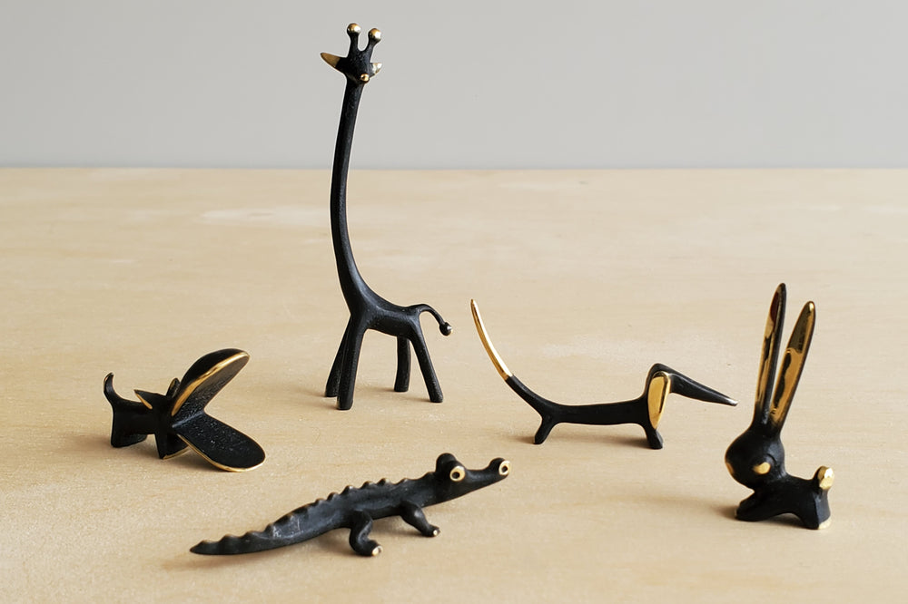 Tiny Austrian Brass Figurines by Walter Bosse  darkened with patina. Giraffe, hippo, Dachshund, alligator and rabbit.