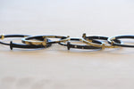Jewelry designers landing page link showing nail bracelets by Pat Flynn.