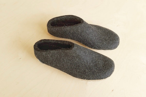 Personal accessories landing page showing slippers from Glerup.