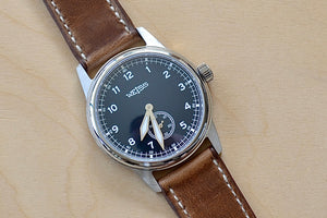 
            
                Load image into Gallery viewer, Weiss Watch 38mm Standard Issue Field Watch with Navy Blue Dial and Brown Horween Leather strap is manually wound, made with American parts, featuring Super Luminova hands and markers for all everyday adventures.. 
            
        