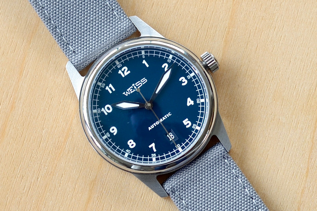 38mm Automatic Issue Field Watch with Blue Dial and Date and Gray Canvas band.