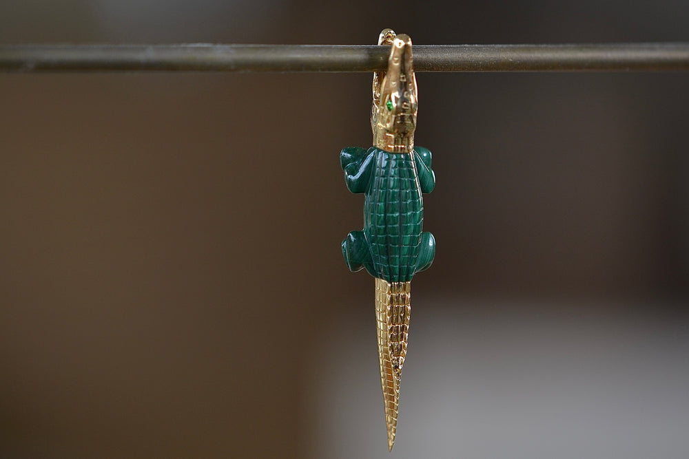 Alligator Bite earring by Bibi Van Der Velden in malachite.