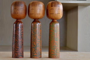 Three Lovely vintage artisan Kokeshi dolls by well known woodworker Kuribayashi Issetsu, founding father of Sosaku-Creative Movement.  Handmade in Japan. Painted and part of his "Mugen" series..