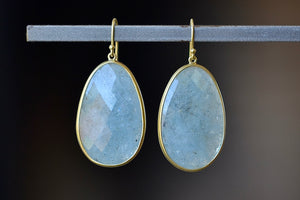 XL Aquamarine Egg Earrings designed by Tej Kothari are Extra large rustic and faceted aquamarine slices, bezel set in 18k yellow gold with gold ear wire.