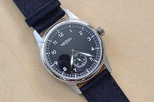 
            
                Load image into Gallery viewer, 38MM Standard Issue Field Watch by Cameron Weiss. Black Dial and manually wound with American parts, hands and markers.
            
        