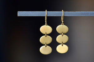 Three tier Rain earrings by Marian Maurer in triple tier and 18k yellow brushed and polished gold. Best everyday earrings.