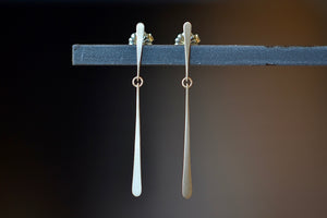 Double Fringe Post Earrings by Carla Caruso are made from one short and one long elongated teardrop fringe connected in the middle with post closure in 14k satin gold, allowing for lots of sparkle. Handmade in Massachusetts.