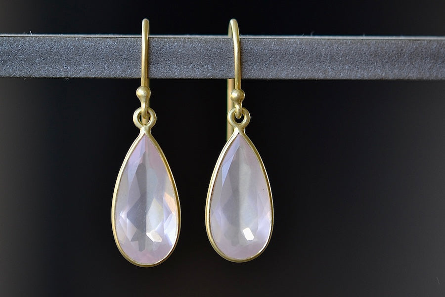 
            
                Load image into Gallery viewer, The Inverted Rose Quartz Drop earrings designed by Tej Kothari are small, lightly faceted, translucent and light weight inverted rose quartz drops on ear wire. One of a kind, lightweight earrings for everyday use..
            
        