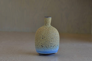 Heather Rosenman Short Green with a tint of brown and Blue flask vase in volcanic glaze. 