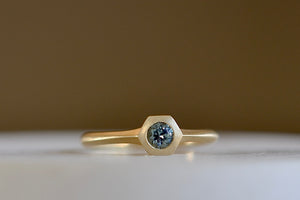 
            
                Load image into Gallery viewer, Petite Hexagon Sapphire Stacking band in teal by Elizabeth Street Jewelry.
            
        