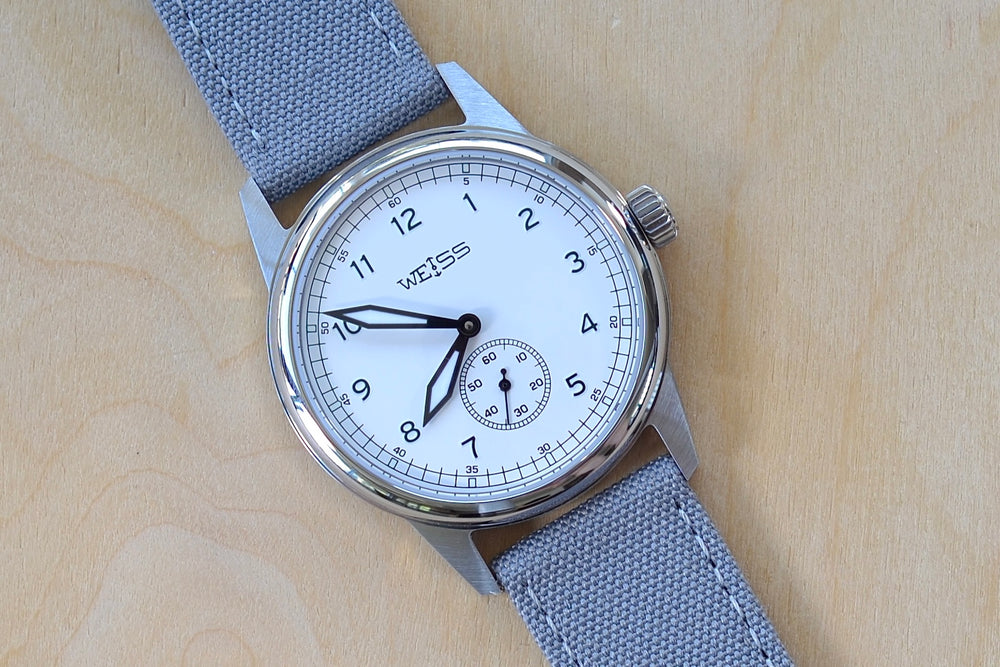
            
                Load image into Gallery viewer, 38MM Standard Issue Field Watch by Cameron Weiss. White Dial and manually wound with American parts, hands and markers.
            
        