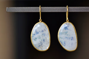 First Frost Large Single Moonstone Drop Earrings by Pippa Small are translucent, lightly faceted and bezel set stones on ear wire in 18k yellow gold.