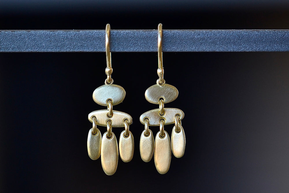 Five fringe Rain earrings by Marian Maurer in 18k yellow brushed and polished gold. Best everyday earrings.