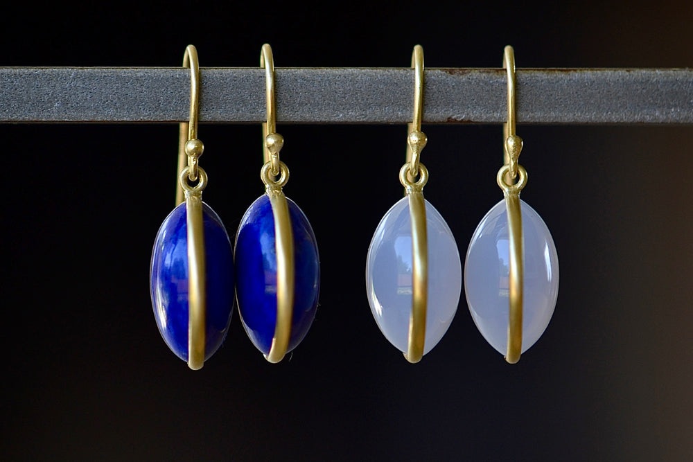 Large Moon Earrings by Tej Kothari are cabachon stones set in 18k gold on earwire. Lapis and Chalcedony. 