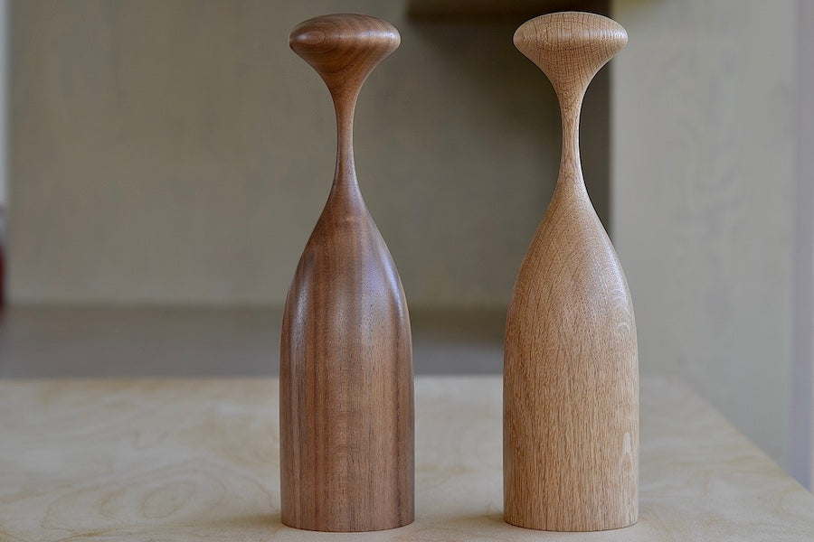 Serratus Pepper Mill Grinders that twist in Black Walnut or White Oak. Ceramic crush grind mechanism that works with rock salt. Made in solid ethically sourced wood in Canada.