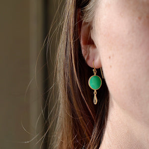 Showing the Moon and drop earrings worn.