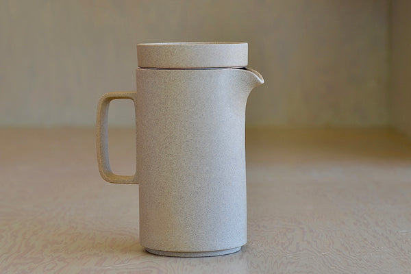 Hasami tall teapot in natural porcelain with tea strainer diffuser and lid. Made in Japan.
