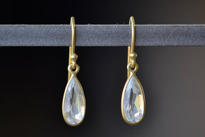 Extra small Petal Inverted crystal Drop Earrings designed by Tej Kothari are Small, faceted, translucent and inverted crystal drops on ear wire form these one of a kind lightweight earrings for everyday use..