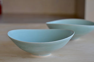 Shallow Plates or bowls in celadon blue by Korean ceramicist Hyejong Kim, Loewe Craft Prize finalist.