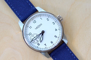
            
                Load image into Gallery viewer, Weiss Watch 42mm Standard Issue Field Watch with White Dial and olive canvas strap is manually wound, made with American parts, featuring Super Luminova hands and markers.
            
        