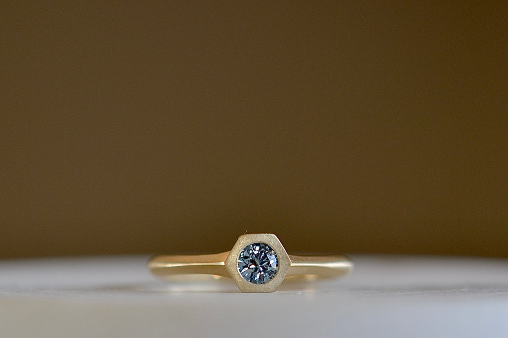 Petite Hexagon Sapphire Stacking band in blue by Elizabeth Street Jewelry.