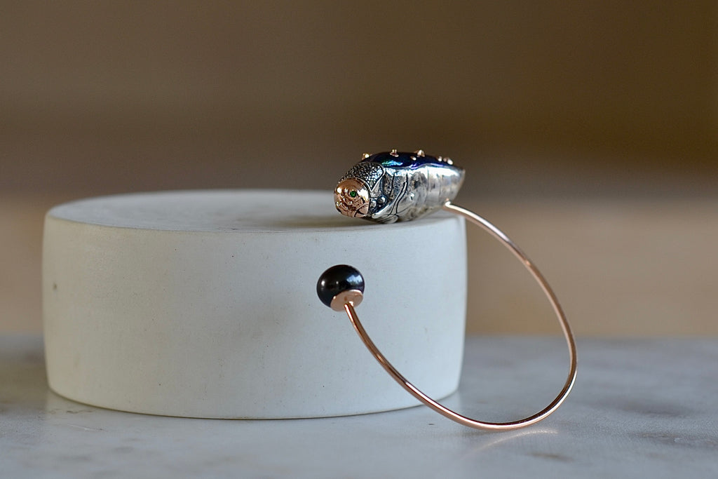 Alternate view of Scarab Pearl bangle by Bibi Van Der Velden is a bracelet bangle in 18k rose gold and sterling with  brown diamonds, a  scarab wing in amethyst  with pink sapphire, tsavorite and a Tahitian pearl.