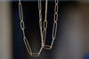 Long and short 14k gold paperclip chains (necklaces) with two short, one long flat clips in 15 or 17 inches by Kaylin Hertel.