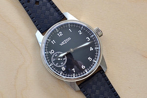 Weiss Watch 42mm Standard Field Watch with Black Dial, shown with black rubber strap is manually wound, made with American parts, featuring Super Luminova hands and markers.