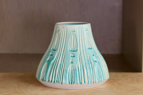 Carved Vase in Turquoise is a one of a kind hand carved Irving Place Studio (IPS) Vase made and signed by Dora De Larios (1933-2018).