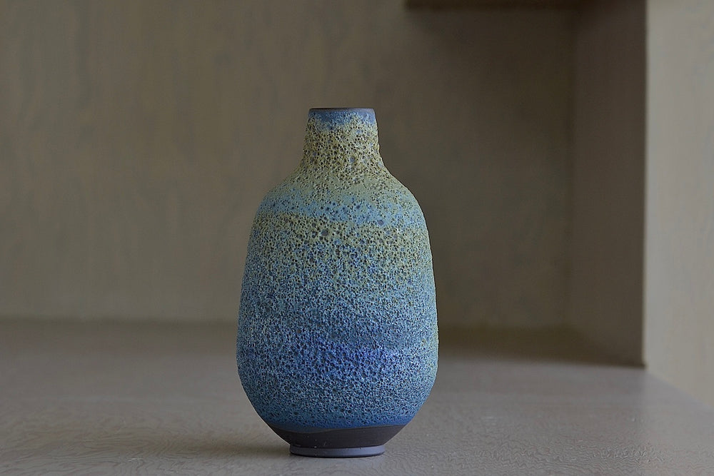 Alternate angle of Heather Rosenman Medium Blue with Yellow Volcanic Vase.