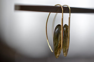 
            
                Load image into Gallery viewer, Side view of small Feather Earrings in Labradorite by Rachel Atherley.
            
        