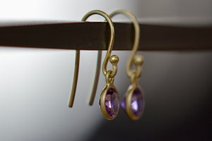 
            
                Load image into Gallery viewer, SIde view of Tiny moon earrings by Tej Kothari in Amethyst.
            
        
