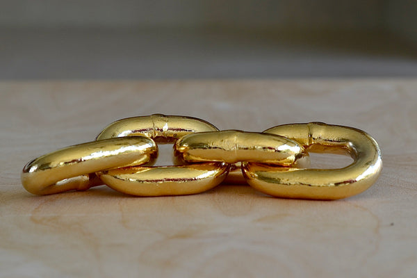 Fresh brass plated paperwieight chain by Werkstette Carl Aubock. 5072