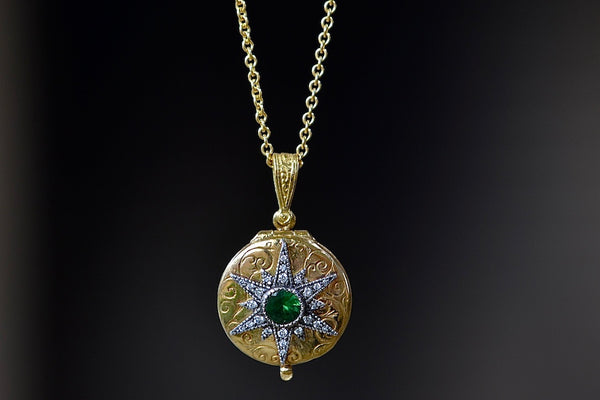 Close up of Arman Sakysian Star Locket with Green Emerald.