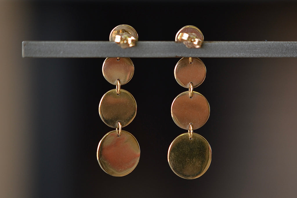 Back of Kaylin Hertel's Petl Dot Drop earrings.