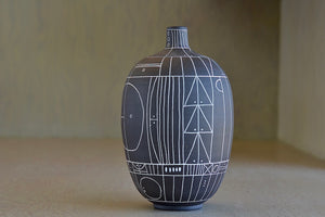 Alternate angle of Hand thrown dark brown clay vase with white  sgraffito "Scribe series" by Heather Rosenman.