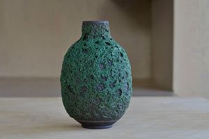 Alternate side of Deep Green Volcanic Glaze vase by Heather Rosenman. Hand Thrown in Los Angeles.