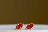 Alternate angle of Prong Set Marquise Sapphire Studs in 14k gold and orange by Elizabeth Street Jewelry.