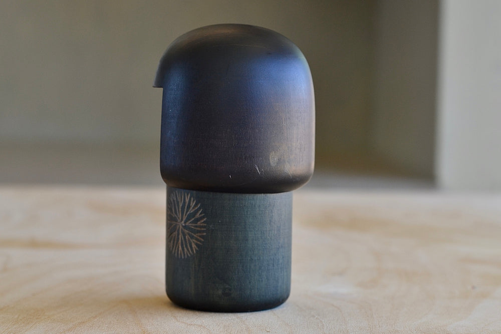 Vintage kokeshi from the back.