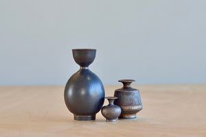 Miniature Hand Thrown Ceramic Vase Trio in Gray Brown by Yuta Segawa on white background.