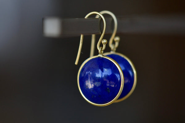 Alternate view of large moon earrings in lapis.