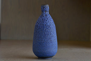 Alternate view of tall Blue Bottle vase in volcanic glaze by Heather Rosenman.