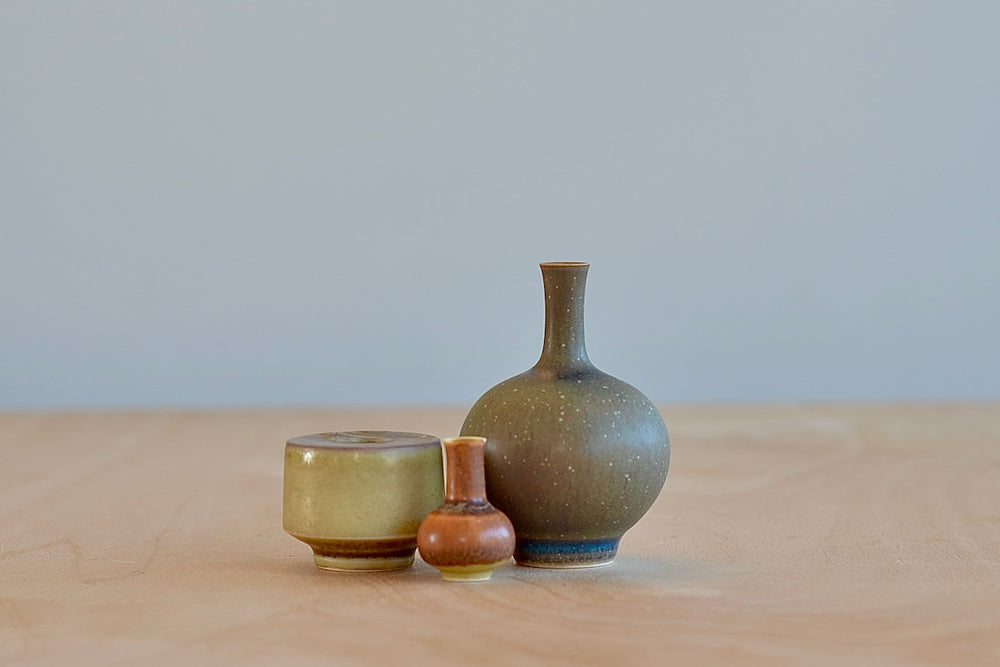 Yuta Segawa Miniature Hand Thrown Ceramic Vase Trio in Green, brown and Taupe against white.