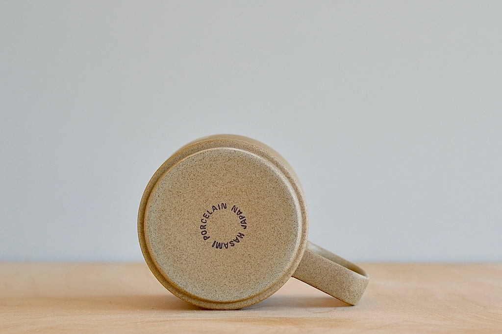 Stamped bottom of Hasami Mug Large 21 in Natural porcelain.