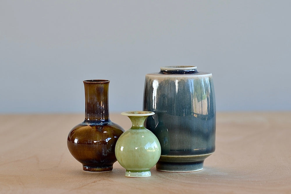 Miniature Hand Thrown Ceramic Vase Trio "H" in Gray, Brown and Green on white by Yuta Segawa.