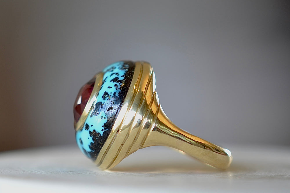 Side view of the Small Petite Lollipop Ring in Turquoise and Garnet by Retrouvai.