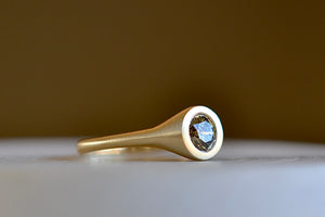 
            
                Load image into Gallery viewer, Side view of Champagne Solitaire signet by Elizabeth Street in a matte gold band.
            
        