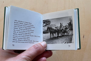 
            
                Load image into Gallery viewer, Image from A rare and out of print Andre Kertesz miniature photo book bound in green velvet with gilt lettering that was published by  Szentendre in 1987 with text in Hungarian, German, English and French.
            
        
